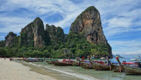 Traditional Tourist Boats on the Beach in the Southern of Thailand
